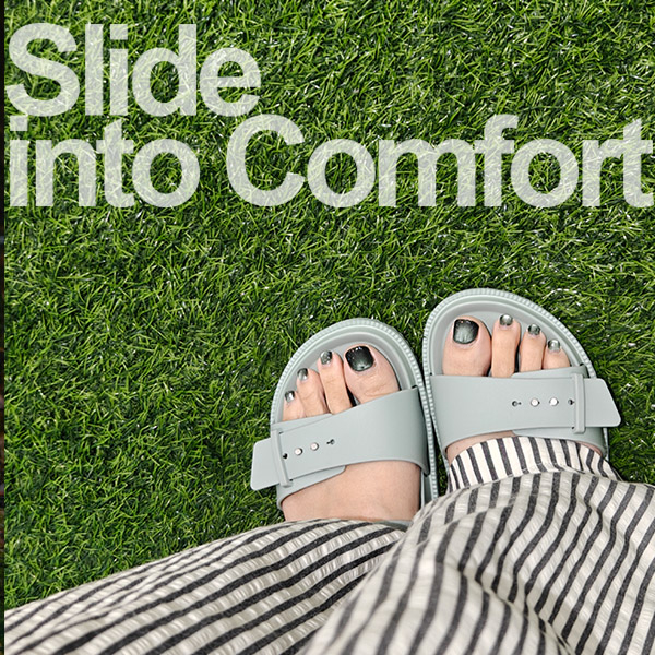 女式简约肩带拖鞋，带精致饰钉细节